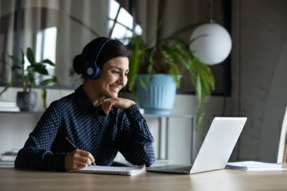 News - woman sitting in front of laptop